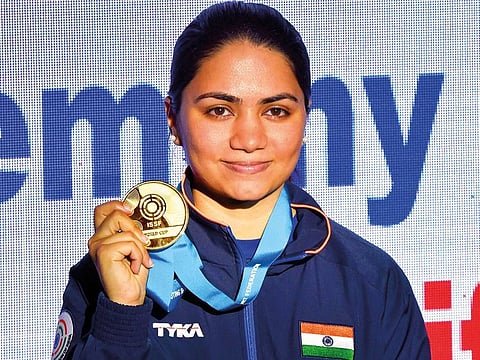 Gold-medallist Indian shooter Apurvi Chandela poses during the medal ceremony after winning the final of women's 10m Air Rifle during the ISSF World Cup Rifle/Pistol, in New Delhi, Saturday, Februry 23, 2019.