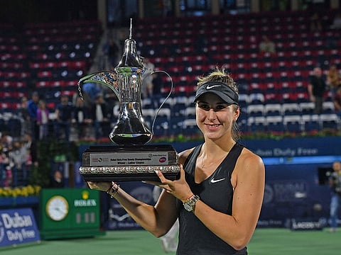 Belinda Bencic posing for picture with trophy after winning the Dubai Duty Free Tennis Championships at Dubai Tennis Stadium on February 23, 2019