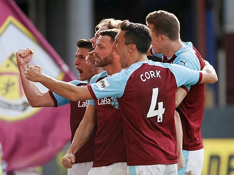 Burnley players celebrate a goal during a Premier League match against Tottenham Hotspur on Saturday.
