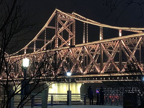 Chinese police stand guard near the Friendship Bridge, which leads to North Korea's Sinuiju across the Yalu River, before a train believed to be carrying North Korean leader Kim Jong Un travels to China through the bridge, in Dandong, Liaoning province, China February 23, 2019.
