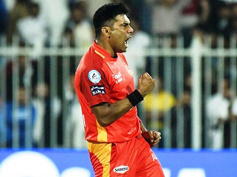 Islamabad United skipper Mohammad Sami celebrates after claiming a hat-trick against Peshawar Zalmi in Sharjah.