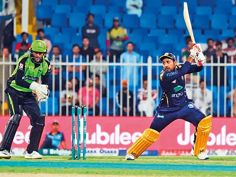 Quetta Gladiators skipper Sarfraz Ahmad cuts a delivery to the fence during his unbeaten 52 against Lahore Qalandars at the Sharjah Cricket Stadium on Saturday.