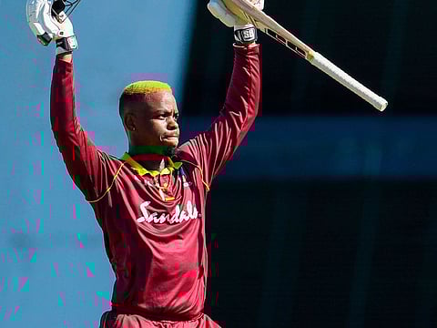 Shimron Hetmyer of West Indies celebrates his century during the 2nd ODI between West Indies and England at Kensington Oval, Bridgetown, Barbados, on February 22, 2019.