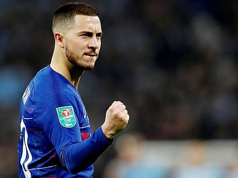 Chelsea's Eden Hazard celebrates scoring a penalty against Manchester City during the English League Cup final at the Wembley Stadium in London on Sunday.