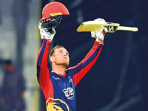 Colin Ingram of Karachi Kings celebrates after achieving his century against Quetta Gladiators on Sunday.