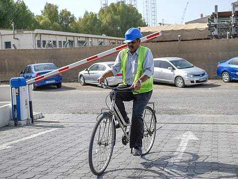 Punnakkan Ali starts from his staff accommodation in Zabeel at 7am and cycles to his office near the Drydocks in Jumeirah.