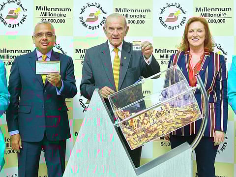 Dubai Duty Free officials Colm McLoughlin, executive vice chairman and CEO; Ramesh Cidambi, chief operating officer and Sinead El Sibai, senior vice president for marketing, conduct the latest Millennium Millionaire Draw.