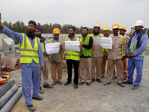 Pictured: Nasir Yousafzai and his co-workers in Dubai as seen in the video