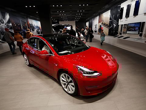 A Model 3 in a Tesla store in Cherry Creek Mall in Denver.