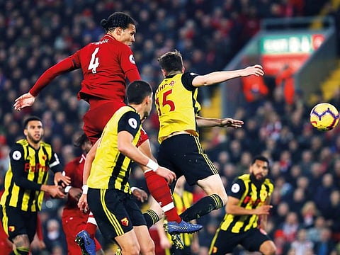 Virgil van Dijk scores Liverpool’s fifth goal against Watford in a Premier League clash at Anfield on Wednesday.