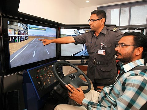 A simulator is used to train heavy vehicle drivers at the Emirates Driving Institute. An average road test lasts for 15 to 20 minutes per candidate.