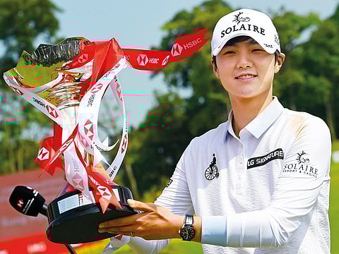 Park Sung-hyun of South Korea poses with the winner's trophy after the final round of the HSBC Women's World Championship at the Sentosa Golf Club in Singapore on March 3, 2019.