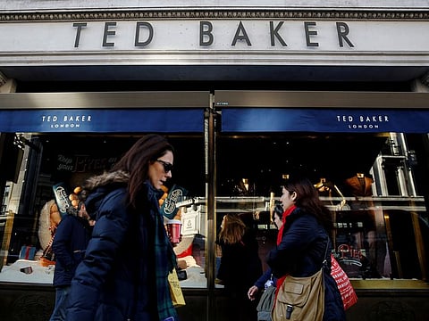 Shoppers walk past a Ted Baker store on Regents Street in London, Britain December 17, 2018