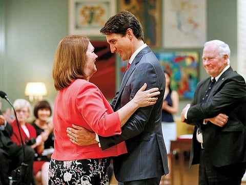 File photo: Canada's Prime Minister Justin Trudeau (R) congratulates Jane Philpott after she was sworn-in as Canada's Minister of Indigenous Services during a cabinet shuffle at Rideau Hall in Ottawa, Ontario, Canada, August 28, 2017.