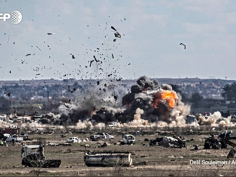 AFP photographer Delil Souleiman captures the shelling of the Daesh group's last holdout of Baghouz in Syria