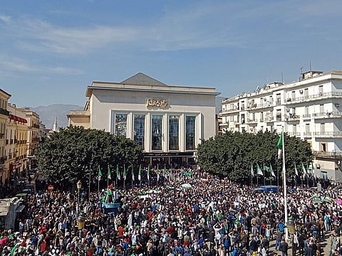 Algerians participate in a protest rally against their ailing president's bid for a fifth term in power