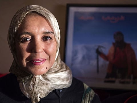 Moroccan mountaineer Bouchra Baibanou is pictured in her home in the Sidi Moussa district of Sale near Rabat on November 29, 2018.