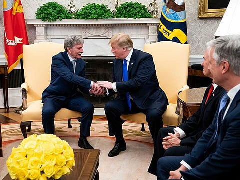 President Donald Trump meets with Danny Burch, an American who was formerly held hostage in Yemen, at the White House in Washington, March 6, 2019.
