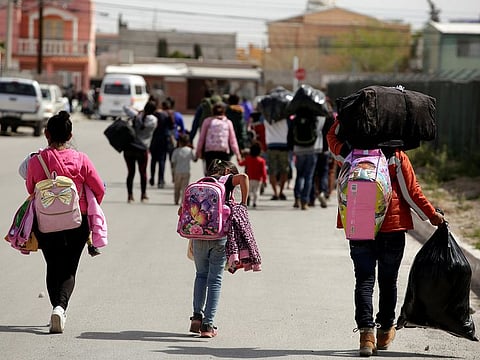 Migrants from Mexico and Central America leave an overcrowded migrant shelter to look for another place to stay in Ciudad Juarez, Mexico March 7, 2019.