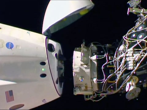 In this image taken from NASA Television, SpaceX's swanky new crew capsule undocks from the International Space Station Friday, March 8, 2019.