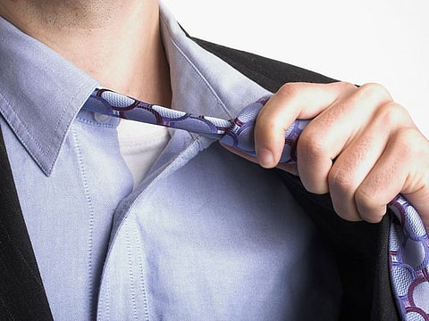 Why companies are telling staff to loosen their neckties