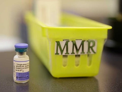 File photo shows a measles, mumps and rubella vaccine on a countertop at a pediatrics clinic. "It is completely unacceptable that children are still dying from measles in 2019," chairman and CEO of the Philippines Red Cross said.