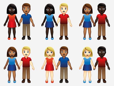 This undated illustration provided by Tinder/Emojination shows new variations of interracial emoji couples.