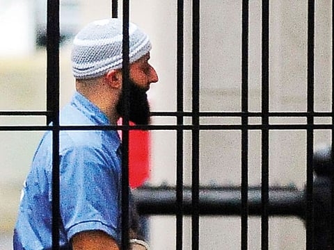 Adnan Syed enters a Courthouse East in Baltimore prior to a hearing in this file photo taken in 2021.