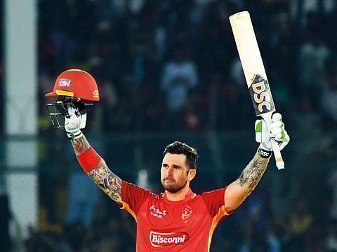 South African Cameron Delport celebrates after hammering the fastest century in the history of PSL off just 49 balls for Lahore Qalandars in Karachi.