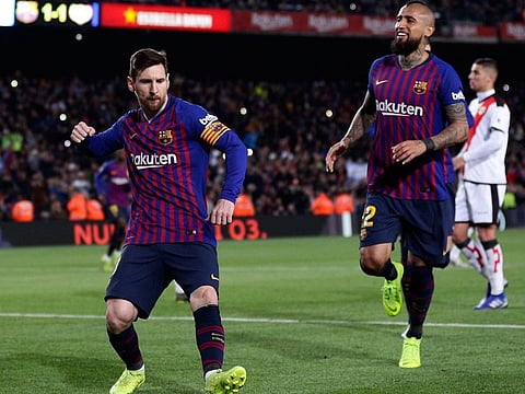 FC Barcelona's Lionel Messi celebrates after scoring his side's second goal from a penalty spot during the Spanish La Liga soccer match between FC Barcelona and Rayo Vallecano at the Camp Nou stadium in Barcelona, Spain, Saturday, March 9, 2019.