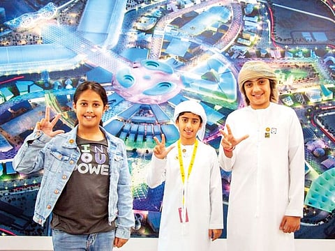 Three young UAE nationals (R-L): Abdullah, Hamdan and Elyazia are driving a community initiative to help Expo 2020 Dubai showcase traditional Emirati hospitality on a global scale.