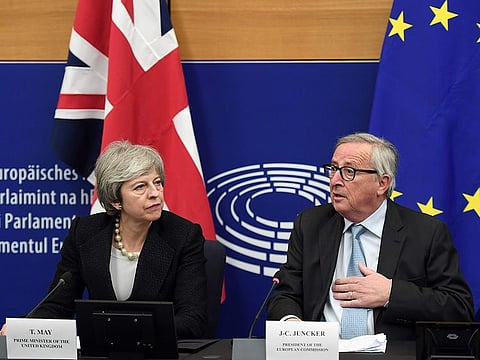 European Commission President Jean-Claude Juncker (R) and British Prime Minister Theresa May give a press conference following their meeting in Strasbourg, on March 11, 2019