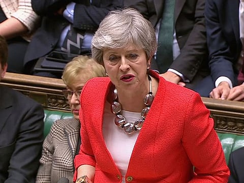 Britain's Prime Minister Theresa May speaks to lawmakers in parliament.