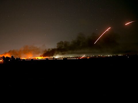 U.S.-backed Syrian Democratic Forces (SDF) fire on Islamic State militant positions in Baghouz
