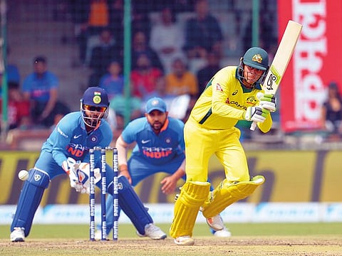 Australian opener Usman Khawaja extended his impressive run-scoring spree in the series with a century in the fifth One Day International against India at Feroz Shah Kotla.