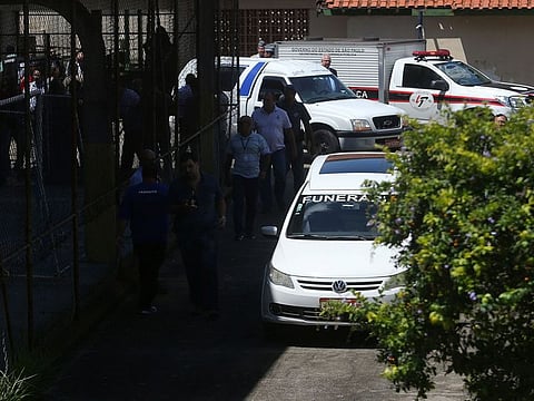 A funerary vehicle is seen at the Raul Brasil school after a shooting in Suzano, Sao Paulo state, Brazil March 13, 2019.