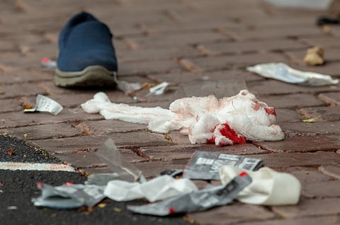 Bloodied bandages on the road following a shooting at the Al Noor mosque in Christchurch, New Zealand, March 15, 2019.