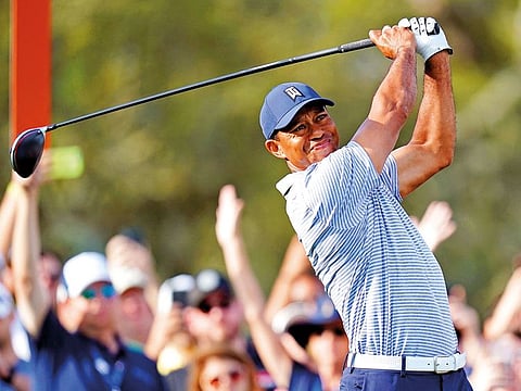 Tiger Woods will be back in action with his son Charlie