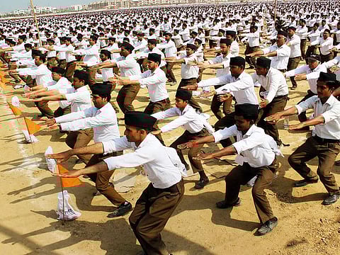 RSS workers perform a drill during a rally organised by the fundamentalist organisation in Meerut.