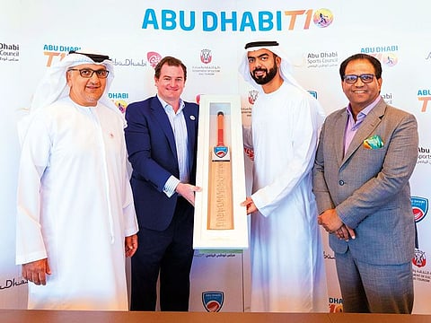 Aref Al Awani, Matt Boucher, acting CEO of Abu Dhabi Cricket and Shaji Ul Mulk after signing the agreement.