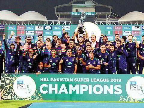 Quetta Gladiators team celebrating their triumph in the Pakistan Super League. after trouncing Peshawar Zalmi by eight wickets in front of a packed crowd at the National Stadium in Karachi.
