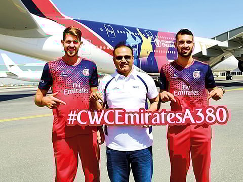 Former India cricketer and ICC Men’s Cricket World Cup 2011 winner, Virender Sehwag (middle), and Emirates sponsored Lancashire team players Saqib Mahmood (right) and Tom Bailey (left) helped to marshal the newly emblazoned aircraft out of the Emirates Engineering hangar.