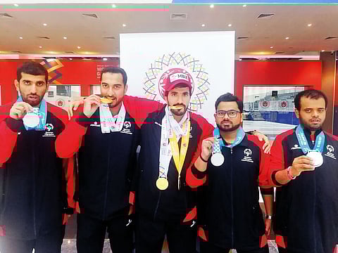 UAE Table Tennis players pose with their medals