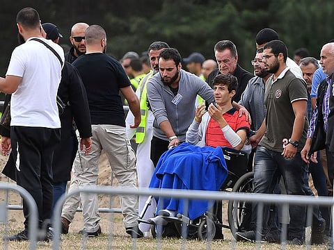 Zaid Mustafa, son and brother of mosque victims Khaled and Hamza Mustafa, leaves after their funeral, the first funerals of the 50 victims of the mosque shootings
