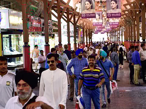 People walking through the Gold Souq in Dubai