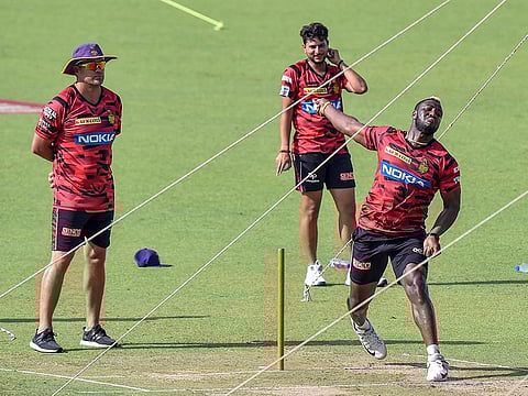 Kolkata Knight Riders' cricketers Andre Russell, Kuldeep Yadav and Coach Jacques Kallis during a practice session, at Eden Garden in Kolkata, on Saturday.