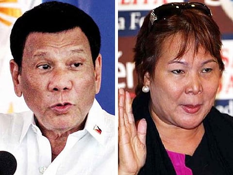Philippine President Rodrigo Duterte (left) and Sandra Cam, board member of the Philippine Charity Sweepstakes Office.