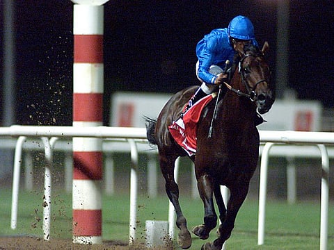 Lanfranco Dettori, the winning jockey of the Dubai World Cup 2000, rides Dubai Millennium to glory.