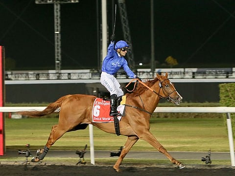 African Story, ridden by Sylvestre de Sousa, wins the Dubai World Cup race at Meydan in 2014.