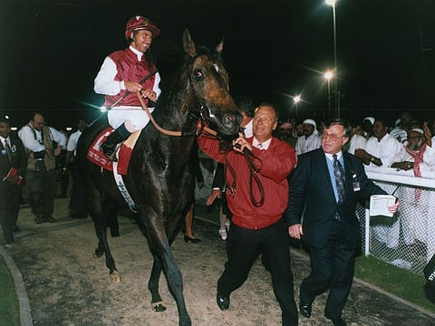 Singspiel, Jerry Bailey astride, is led into the winner‘s paddock after his victory in the 1997 Dubai World Cup.
